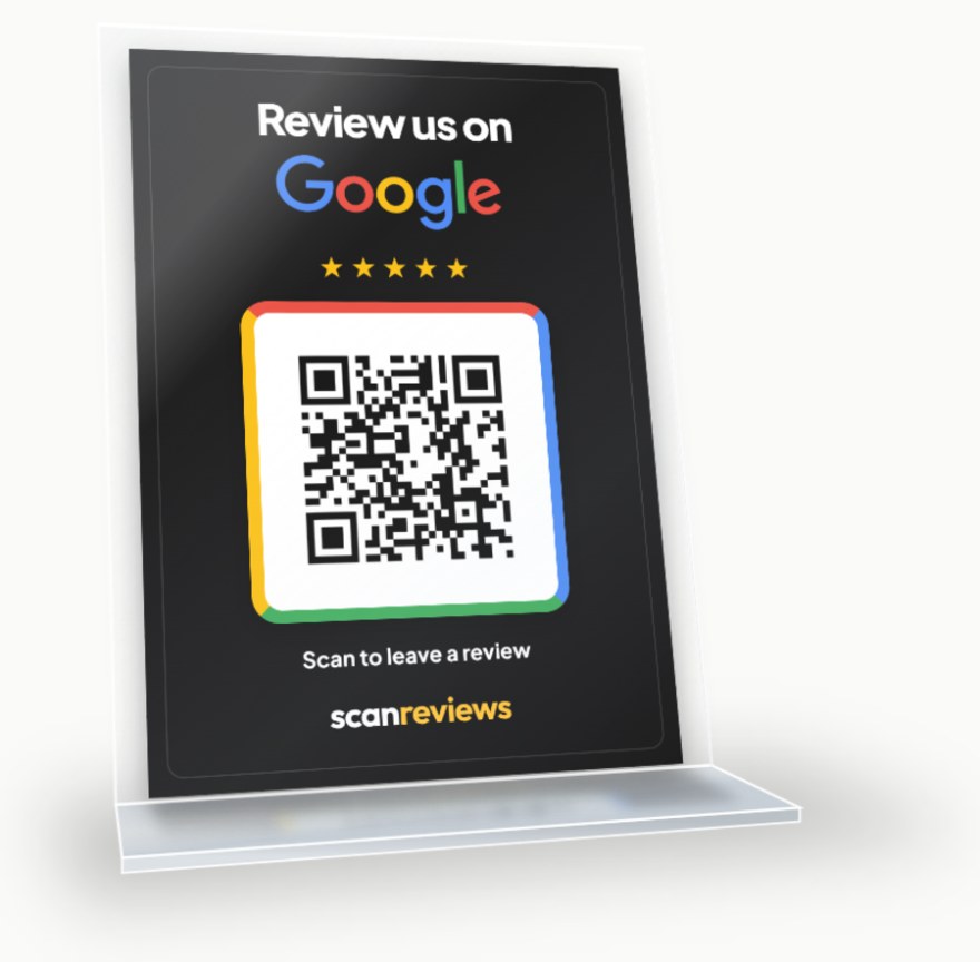 ScanReviews Google review card in its clear acrylic desk stand